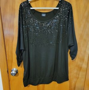 Black sequinsed pullover shirt.